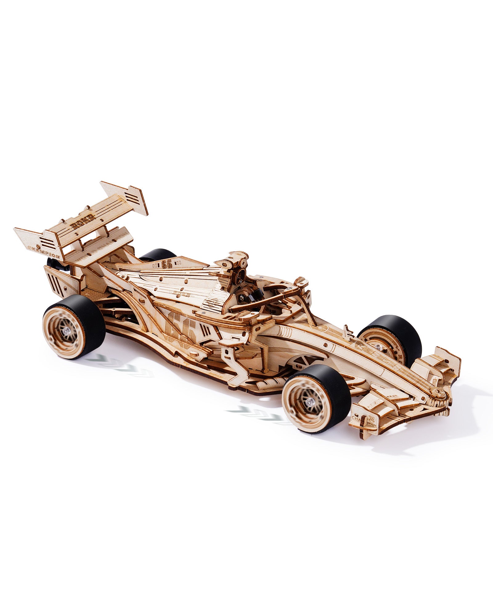 Wooden model of a Formula 1 car on a white background