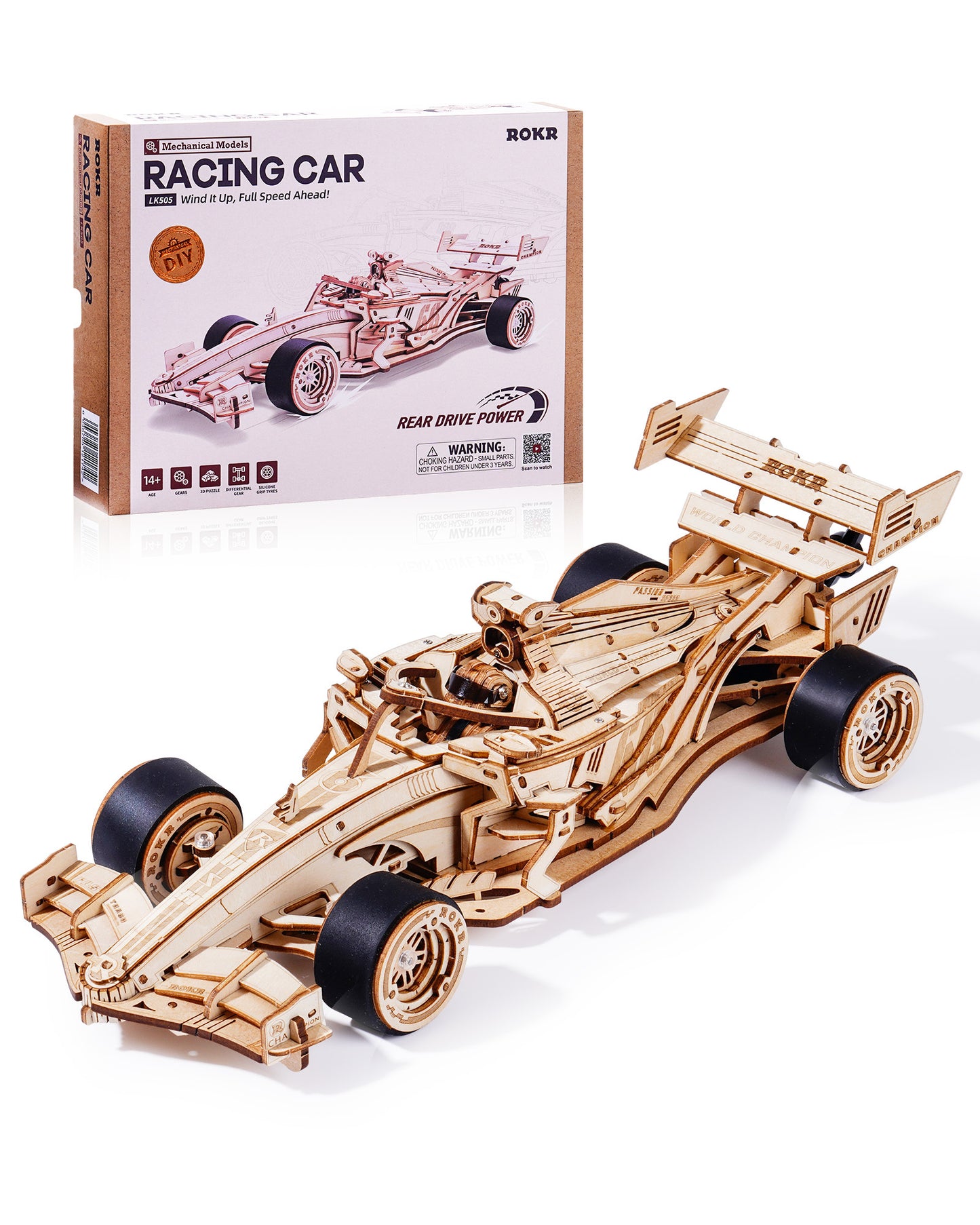 Wooden racing car model with packaging on a white background