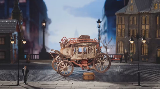 video of Elegant mechanical music box with visible gears and delicate woodland illustrations, crafted from polished wood—perfect as a heartfelt gift for a child or loved one